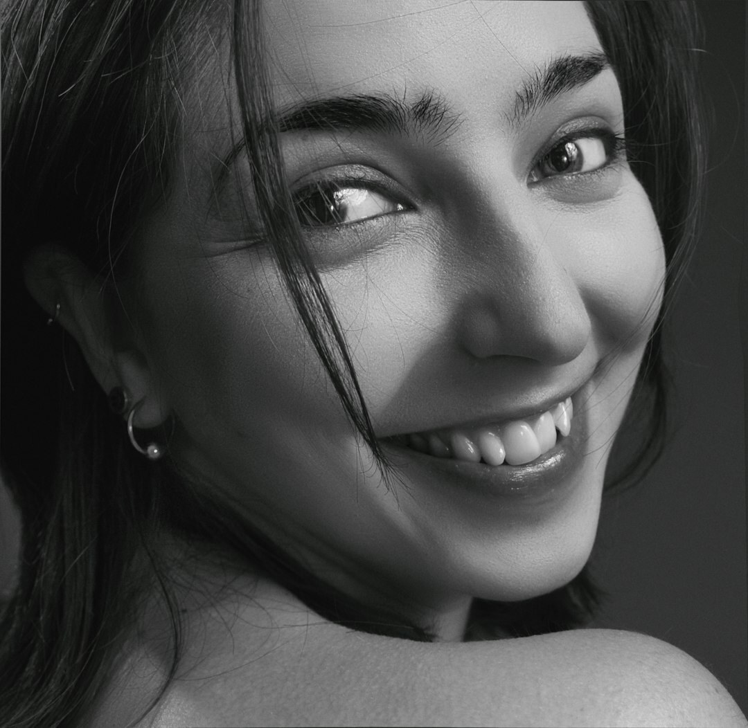 Studio portrait of a smiling woman