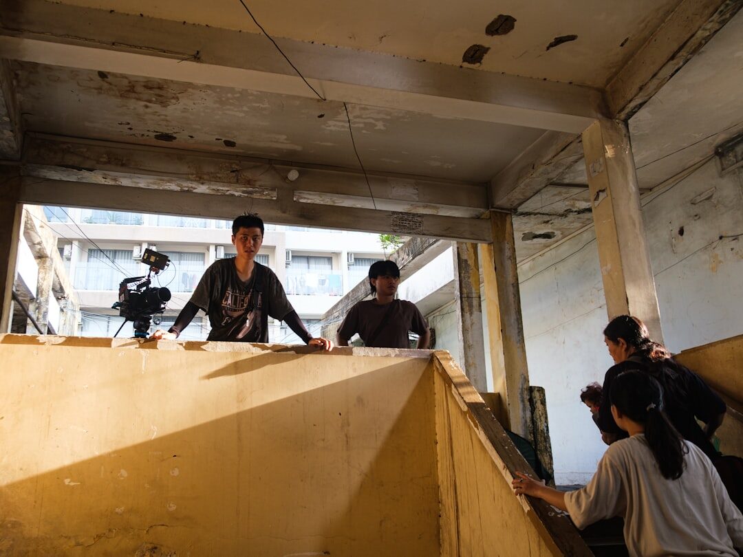 actor with colleague on film set