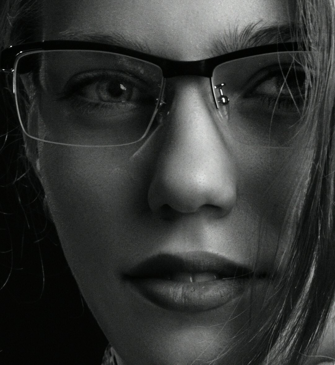 Studio portrait of a woman with glasses
